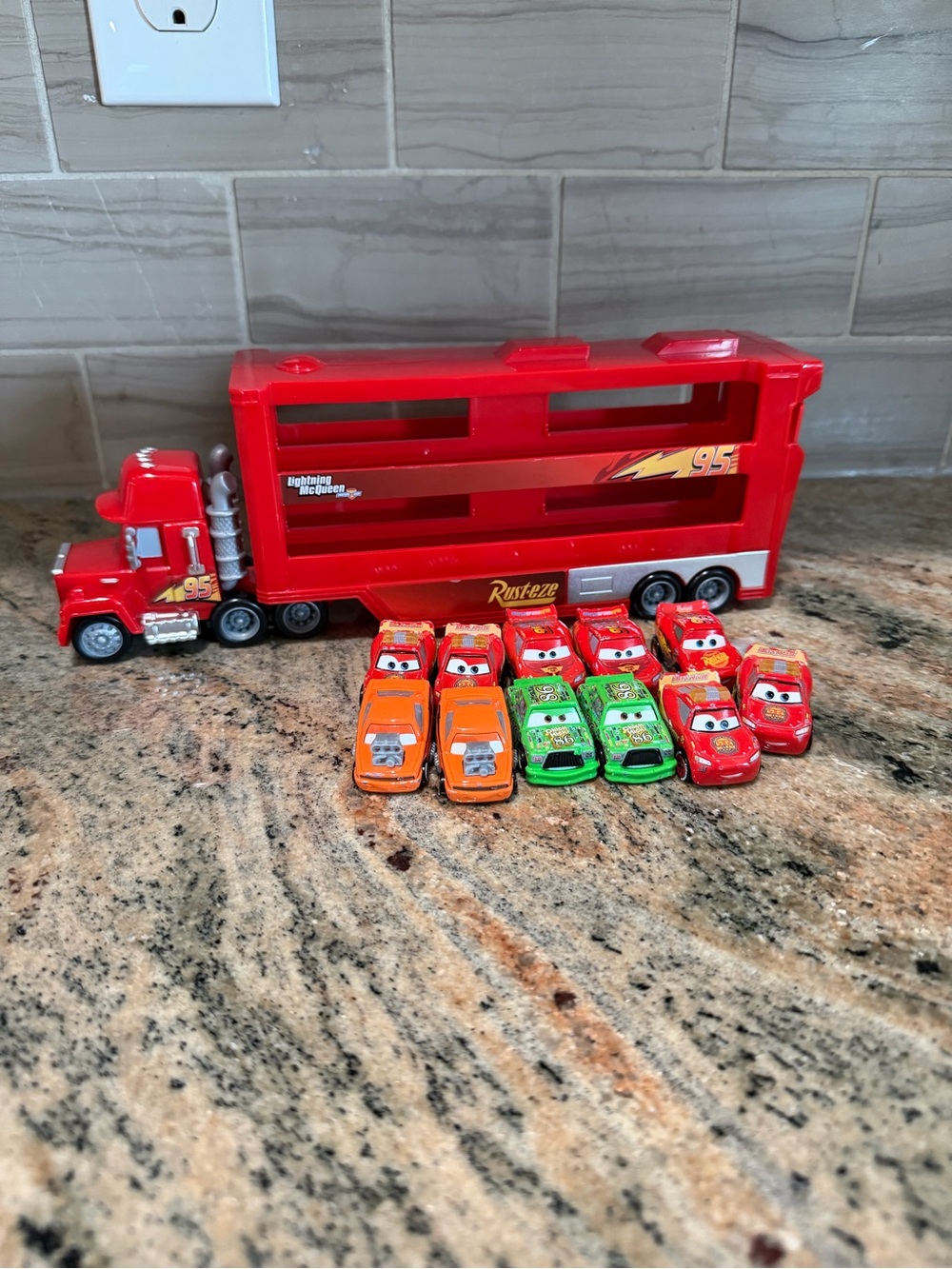 Disney Pixar Cars Mini Racers Mack Hauler Truck - comes with 11 mini cars